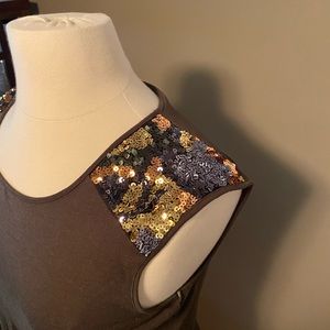 Embellished tank